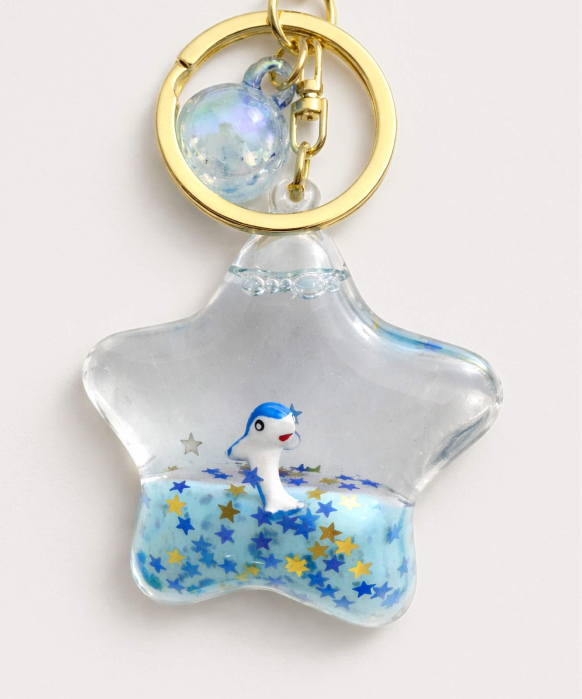 Dolphin star liquid glitter keychain blue floating animal charm